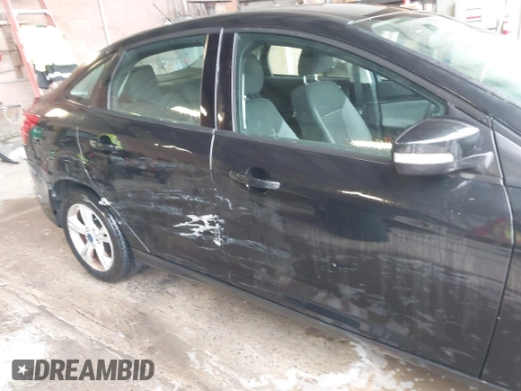 2013 Ford Focus SE with VIN 1FADP3F21DL333194, listed as a IAAI auction lot 42071641 with 107,912 mi miles. Bid and sale history available at carsss.com. Image 6.