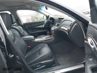 2013 Infiniti M37 with VIN JN1BY1AP5DM512423, listed as a IAAI auction lot 41063320 with 113,075 mi miles. Bid and sale history available at carsss.com. Image 5.