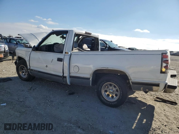 1996 Chevrolet Silverado 1500 with VIN 1GCEC14R1TZ185395, listed as a Copart auction lot 42244085 with 545,084 mi miles and Salvage Title. Bid and sale history available at DreamBid. Image 2.
