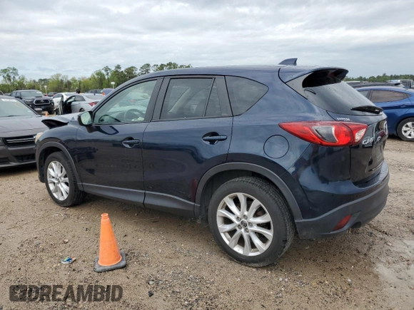 2015 Mazda CX-5 Grand Touring with VIN JM3KE2DY1F0466011, listed as a Copart auction lot 50695165 with 51,967 mi miles and Salvage Title. Bid and sale history available at carsss.com. Image 2.