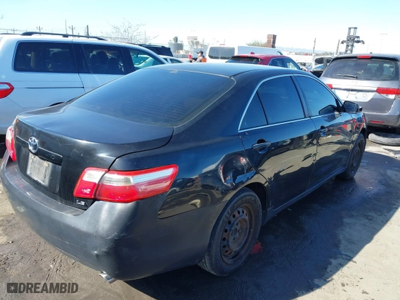 2009 Toyota Camry LE with VIN 4T1BK46K59U588353, listed as a IAAI auction lot 41861335 with 192,542 mi miles. Bid and sale history available at carsss.com. Image 4.