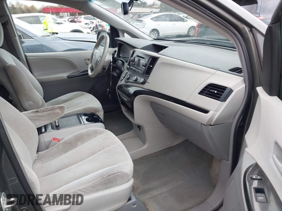 2012 Toyota Sienna LE AAS with VIN 5TDKK3DC5CS253020, listed as a IAAI auction lot 40900034 with 208,421 mi miles. Bid and sale history available at carsss.com. Image 5.