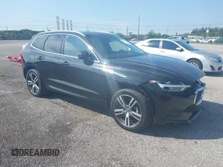 2021 Volvo XC60 Momentum z VIN YV4102DK2M1715161, wystawiony jako IAAI lot #42096448 z przebiegiem 57 784 mil mil oraz . Historia ofert i sprzedaży dostępna na DreamBid. Obrazek 1.