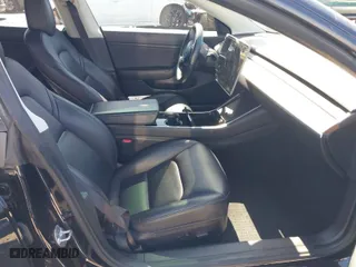 2019 Tesla Model 3 Mid Range with VIN 5YJ3E1EA5KF306816, listed as a IAAI auction lot 41710916 with 76,222 mi miles. Bid and sale history available at carsss.com. Image 5.