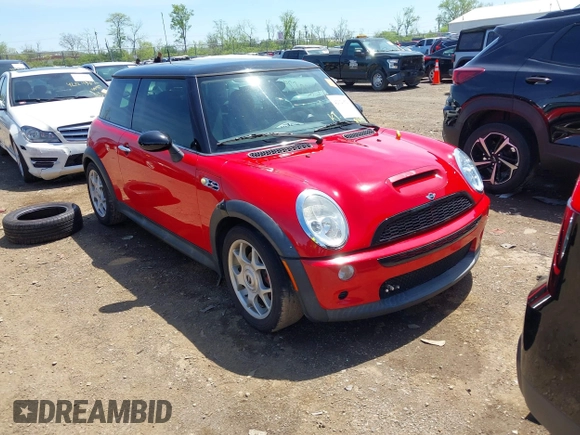2003 MINI Hardtop S z VIN WMWRE33443TD60271, wystawiony jako IAAI lot #42129529 z przebiegiem 94 082 mil mil oraz . Historia ofert i sprzedaży dostępna na DreamBid. Obrazek 1.