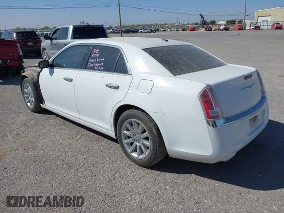 2014 Chrysler 300 with VIN 2C3CCAEG4EH312930, listed as a IAAI auction lot 41907509 with 128,940 mi miles. Bid and sale history available at carsss.com. Image 3.