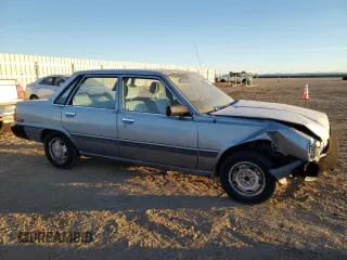1986 Toyota Camry z VIN JT2SV12E9G0477991, wystawiony jako Copart lot #85531214 z przebiegiem 297 033 mil mil oraz Czysty tytuł • Clean title. Historia ofert i sprzedaży dostępna na DreamBid. Obrazek 4.