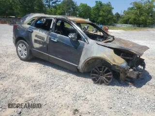 2021 Cadillac XT5 FWD Luxury with VIN 1GYKNAR40MZ144522, listed as a Copart auction lot 53457035 with Not provided miles and Non repairable. Bid and sale history available at DreamBid. Image 4.