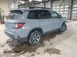2022 Honda Passport TrailSport with VIN 5FNYF8H68NB003147, listed as a IAAI auction lot 41269006 with 61,026 mi miles and . Bid and sale history available at DreamBid. Image 4.