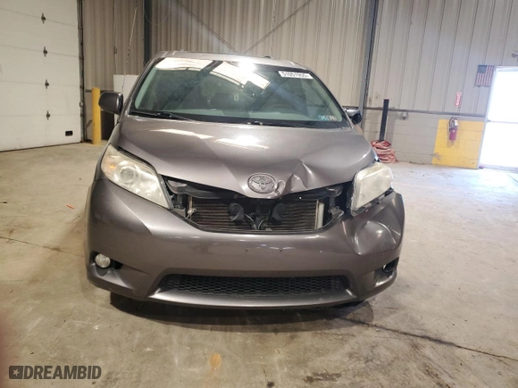 2012 Toyota Sienna XLE AAS with VIN 5TDYK3DC5CS194951, listed as a Copart auction lot 51051955 with 196,190 mi miles and Salvage Title. Bid and sale history available at carsss.com. Image 5.