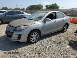 2012 Mazda 3 i Touring with VIN JM1BL1V86C1557191, listed as a Copart auction lot 63002985 with 218,863 mi miles and Clean title. Bid and sale history available at DreamBid. Image 1.