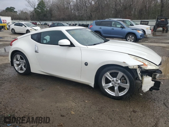 2012 Nissan 370Z z VIN JN1AZ4EHXCM562486, wystawiony jako Copart lot #44594005 z przebiegiem 79 150 mil mil oraz Szkoda całkowita • Salvage title. Historia ofert i sprzedaży dostępna na DreamBid. Obrazek 4.