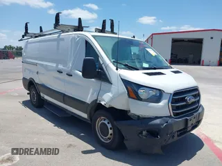 2020 Ford Transit Cargo z VIN 1FTBR1Y84LKA19741, wystawiony jako IAAI lot #42350802 z przebiegiem 90 186 mil mil oraz . Historia ofert i sprzedaży dostępna na DreamBid. Obrazek 1.