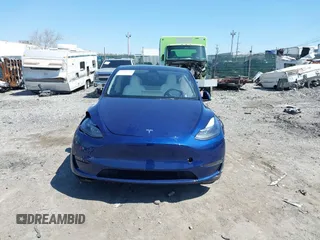 2023 Tesla Model Y Performance z VIN 7SAYGDEF4PF844933, wystawiony jako IAAI lot #42048999 z przebiegiem Nie podano mil oraz . Historia ofert i sprzedaży dostępna na DreamBid. Obrazek 11.