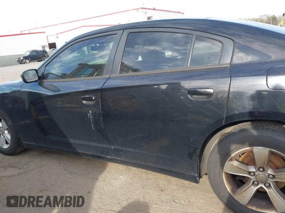 2014 Dodge Charger SE with VIN 2C3CDXBG9EH287009, listed as a IAAI auction lot 41924116 with 190,725 mi miles and . Bid and sale history available at carsss.com. Image 14.
