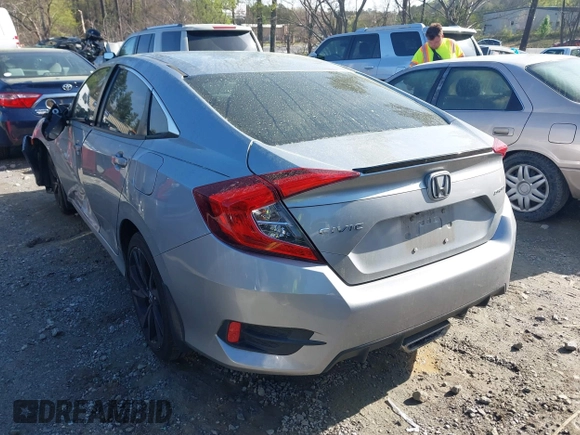 2019 Honda Civic Sport with VIN 19XFC2F88KE034868, listed as a IAAI auction lot 41913004 with 60,599 mi miles and . Bid and sale history available at DreamBid. Image 3.