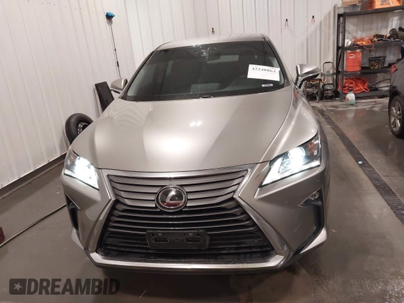 2018 Lexus RX 350 with VIN 2T2BZMCA7JC163886, listed as a IAAI auction lot 42248863 with 57,319 mi miles and . Bid and sale history available at DreamBid. Image 13.