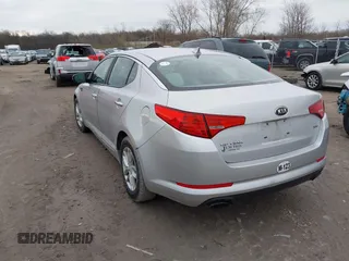 2013 Kia Optima LX with VIN KNAGM4A75D5310401, listed as a IAAI auction lot 41959774 with 198,339 mi miles. Bid and sale history available at carsss.com. Image 3.
