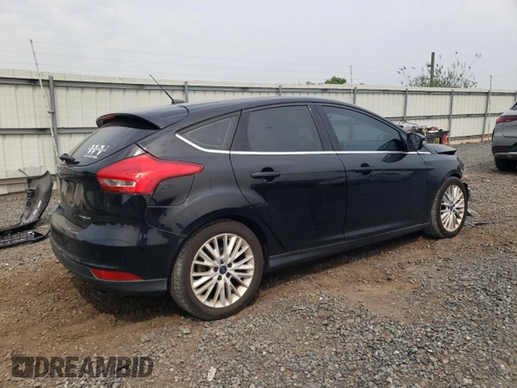 2016 Ford Focus Titanium with VIN 1FADP3N2XGL299598, listed as a Copart auction lot 60832285 with 121,482 mi miles and Salvage title. Bid and sale history available at DreamBid. Image 3.