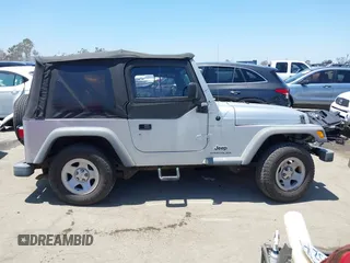 2004 Jeep Wrangler SE with VIN 1J4FA29134P715165, listed as a IAAI auction lot 42297821 with 109,397 mi miles and . Bid and sale history available at DreamBid. Image 14.