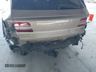 2021 Genesis GV80 with VIN KMUHCESC5MU031187, listed as a IAAI auction lot 42003804 with 65,909 mi miles and . Bid and sale history available at DreamBid. Image 6.
