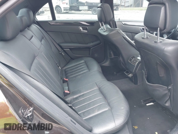 2010 Mercedes-Benz E-Class E 550 Luxury with VIN WDDHF9AB4AA128264, listed as a IAAI auction lot 41842230 with 216,724 mi miles. Bid and sale history available at carsss.com. Image 8.