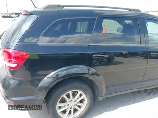 2015 Dodge Journey SXT with VIN 3C4PDCBG5FT604847, listed as a IAAI auction lot 42108853 with 164,679 mi miles. Bid and sale history available at carsss.com. Image 13.