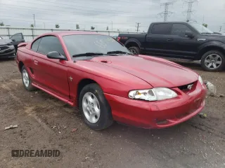 1997 Ford Mustang with VIN 1FALP4040VF166533, listed as a Copart auction lot 66524354 with 71,082 mi miles and Salvage Title. Bid and sale history available at carsss.com. Image 4.