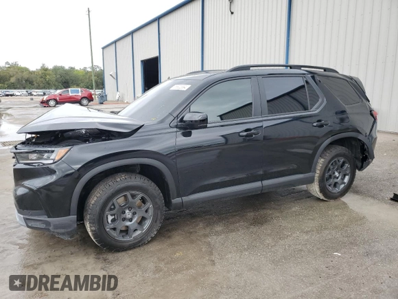 2025 Honda Pilot TrailSport with VIN 5FNYG1H63SB087572, listed as a Copart auction lot 86802994 with 962 mi miles and Salvage Title. Bid and sale history available at carsss.com. Image 1.