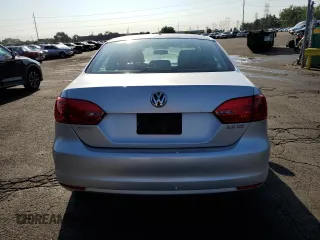 2013 Volkswagen Jetta SE with VIN 3VWDP7AJ0DM244230, listed as a Copart auction lot 61310145 with 115,360 mi miles and Salvage title. Bid and sale history available at DreamBid. Image 6.