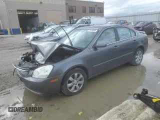 2008 Kia Optima LX z VIN KNAGE124685235598, wystawiony jako Copart lot #79134604 z przebiegiem 166 796 mil mil oraz Szkoda całkowita • Salvage title. Historia ofert i sprzedaży dostępna na DreamBid. Obrazek 1.