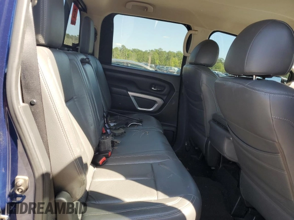 2017 Nissan Titan SV z VIN 1N6AA1EJ9HN543349, wystawiony jako Copart lot #50994035 z przebiegiem Nie podano mil oraz Szkody całkowita. Historia ofert i sprzedaży dostępna na DreamBid. Obrazek 11.