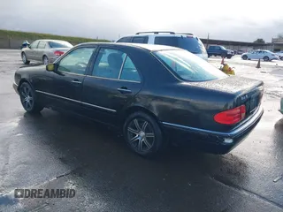 1997 Mercedes-Benz E-Class with VIN WDBJF72F1VA281514, listed as a IAAI auction lot 41586496 with 283,212 mi miles. Bid and sale history available at carsss.com. Image 3.
