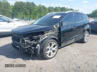 2017 Ford Escape Titanium with VIN 1FMCU0J91HUA75417, listed as a IAAI auction lot 42044170 with 116,431 mi miles. Bid and sale history available at carsss.com. Image 23.