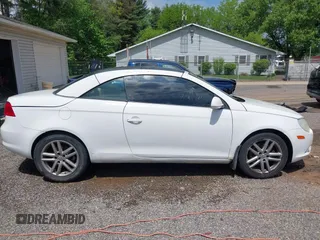 2008 Volkswagen Eos Lux z VIN WVWFA71F88V018635, wystawiony jako IAAI lot #42220306 z przebiegiem 155 448 mil mil oraz . Historia ofert i sprzedaży dostępna na DreamBid. Obrazek 13.