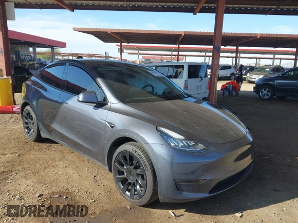 2022 Tesla Model Y Long Range with VIN 7SAYGDEE2NA017434, listed as a IAAI auction lot 41842025 with 35,164 mi miles and . Bid and sale history available at DreamBid. Image 1.