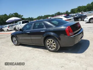 2008 Chrysler 300 C Hemi with VIN 2C3KA63H08H156142, listed as a Copart auction lot 53741595 with 216,677 mi miles and Salvage Title. Bid and sale history available at carsss.com. Image 2.