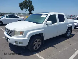 2013 Honda Ridgeline RTL with VIN 5FPYK1F50DB013612, listed as a IAAI auction lot 42430119 with 190,913 mi miles and . Bid and sale history available at DreamBid. Image 2.