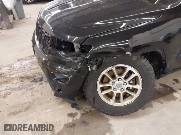 2018 Jeep Grand Cherokee Laredo E with VIN 1C4RJFAG0JC154937, listed as a IAAI auction lot 41966764 with 85,415 mi miles and . Bid and sale history available at DreamBid. Image 6.