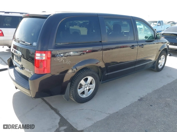 2010 Dodge Grand Caravan SE with VIN 2D4RN4DE4AR307803, listed as a IAAI auction lot 41838330 with 87,863 mi miles. Bid and sale history available at carsss.com. Image 4.