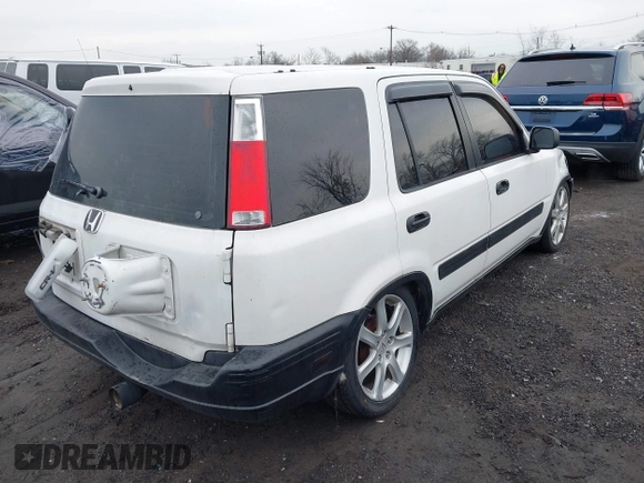 2000 Honda CR-V LX with VIN JHLRD2844YC010848, listed as a IAAI auction lot 41678830 with 173,137 mi miles. Bid and sale history available at carsss.com. Image 4.