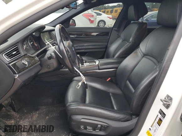 2013 BMW 7 Series 750i with VIN WBAYA8C54DC996569, listed as a Copart auction lot 74199774 with 107,871 mi miles and Salvage Title. Bid and sale history available at DreamBid. Image 7.