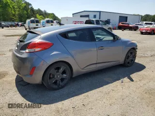 2016 Hyundai Veloster z VIN KMHTC6AD4GU273160, wystawiony jako Copart lot #52107985 z przebiegiem 120 884 mil mil oraz Szkoda całkowita • Salvage title. Historia ofert i sprzedaży dostępna na DreamBid. Obrazek 3.