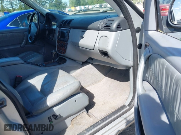 2000 Mercedes-Benz M-Class with VIN 4JGAB54E7YA146298, listed as a IAAI auction lot 42146029 with 1 mi miles. Bid and sale history available at carsss.com. Image 5.