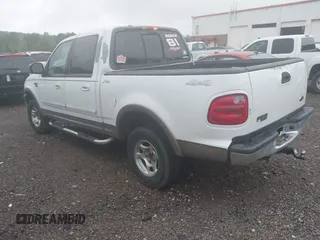 2002 Ford F-150 XLT with VIN 1FTRW08L92KB32427, listed as a IAAI auction lot 41968814 with 325,372 mi miles. Bid and sale history available at carsss.com. Image 3.