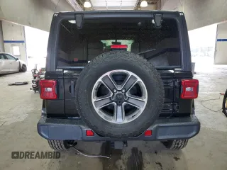 2021 Jeep Wrangler Unlimited Sahara High Altitude with VIN 1C4HJXEG9MW571844, listed as a Copart auction lot 81482334 with 77,409 mi miles and Salvage title. Bid and sale history available at DreamBid. Image 6.