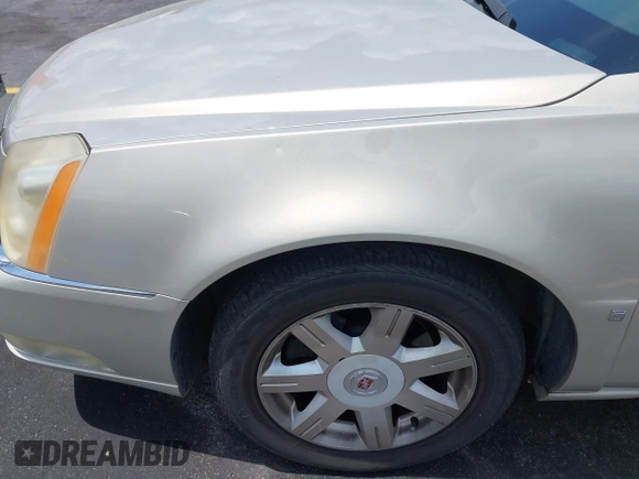 2008 Cadillac DTS 1SC with VIN 1G6KD57Y38U100381, listed as a IAAI auction lot 42173059 with 146,669 mi miles and . Bid and sale history available at carsss.com. Image 6.