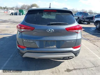 2017 Hyundai Tucson Value with VIN KM8J33A25HU402366, listed as a IAAI auction lot 41814426 with 117,669 mi miles. Bid and sale history available at carsss.com. Image 16.