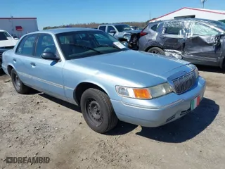 2001 Mercury Grand Marquis LS with VIN 2MEFM75W21X652284, listed as a IAAI auction lot 41821773 with 179,711 mi miles. Bid and sale history available at carsss.com. Image 1.