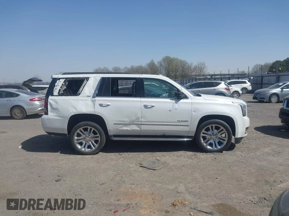 2017 GMC Yukon SLT with VIN 1GKS1BKC9HR278190, listed as a IAAI auction lot 41824213 with 104,323 mi miles. Bid and sale history available at carsss.com. Image 13.